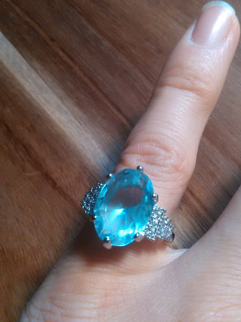 Blue Cubic Zirconia and Crystal Accent Silver Plated Ring (Size 5.75)
